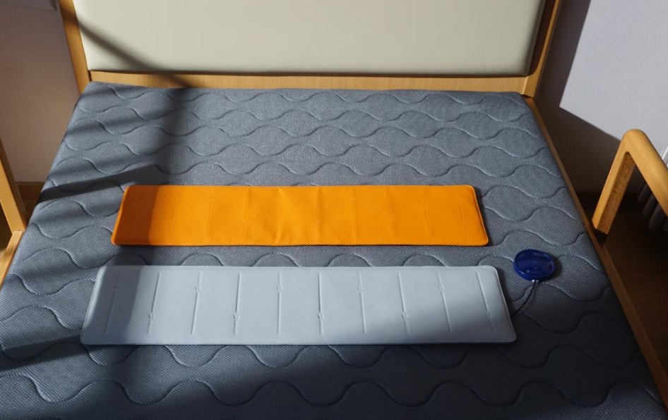 Care pads on a bed